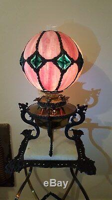 Antique iron lamp with stand and stained glass globe shade
