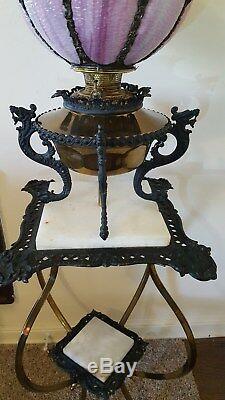 Antique iron lamp with stand and stained glass globe shade