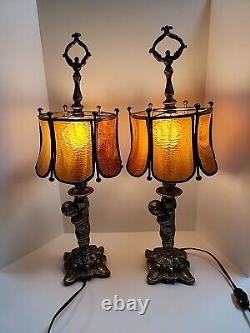 Pair of VTG L&L WMC Metal Cherub Table Lamps withAmber Stained Glass Shades