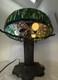 Vintage Stained Glass Table Lamp With Floral Design And Dark Base
